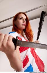 Tina STANDINGPOSE WITH DAGGER AND BASEBALL BAT 